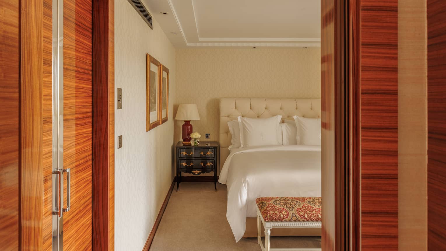 Elegant bedroom of Presidential Suite at Four Seasons Hotel London