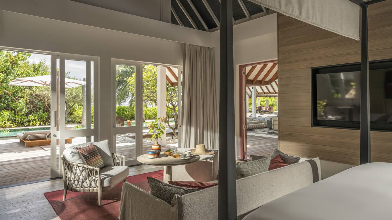 Bedroom looking out to private pool terrace