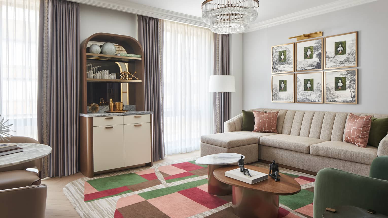 Stylish living room with sofa and wet bar of Premier Suite East Wing at Four Seasons Hotel Washington, DC