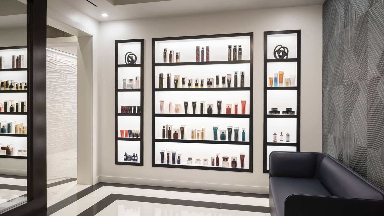 A wall of spa and skin care items for purchase.
