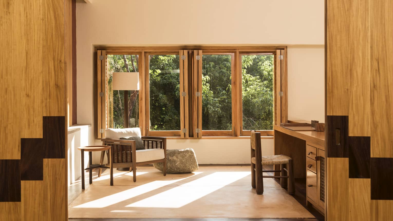 Room with arm chair and desk