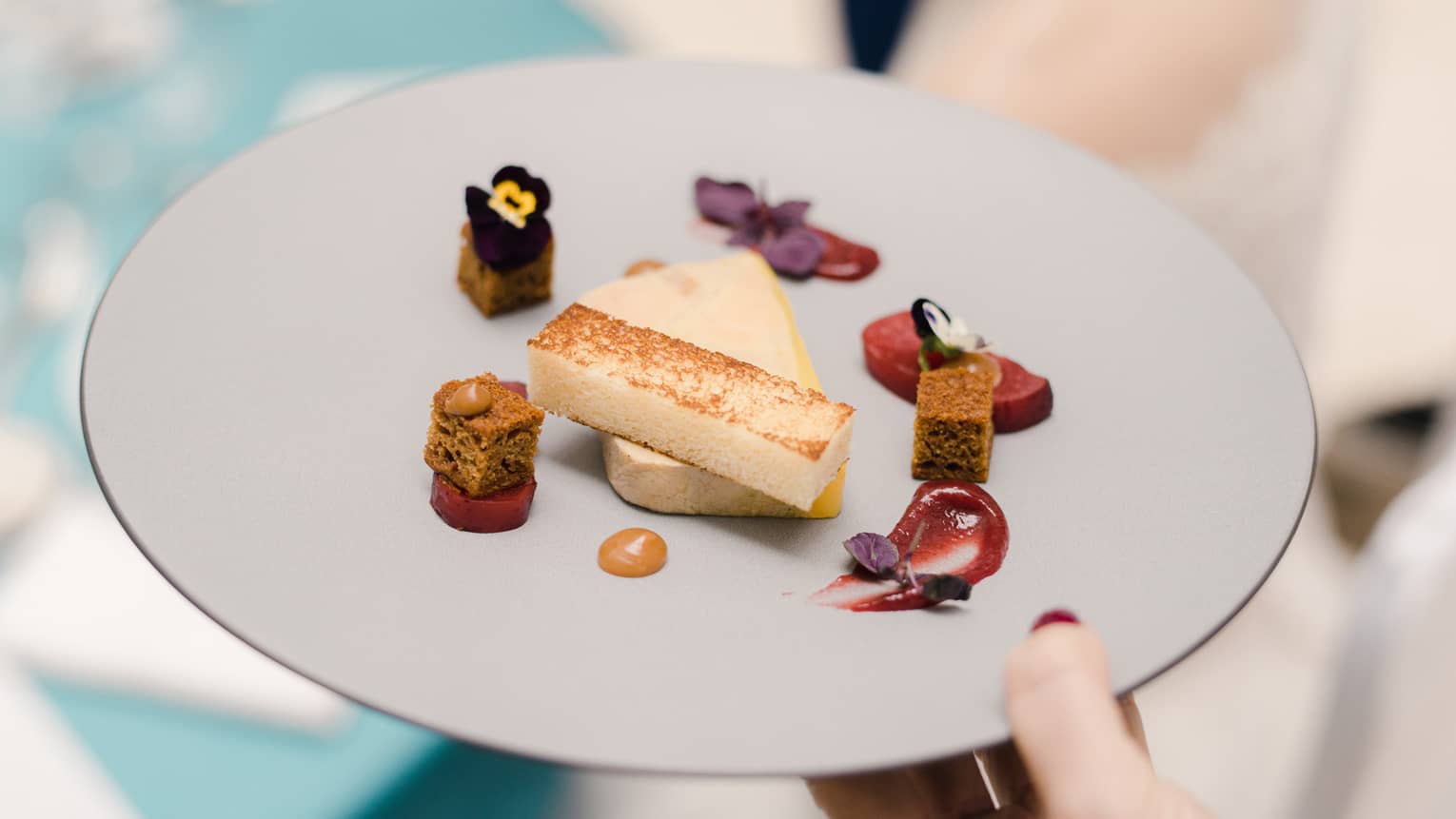 Gray plate of bite-sized canapés