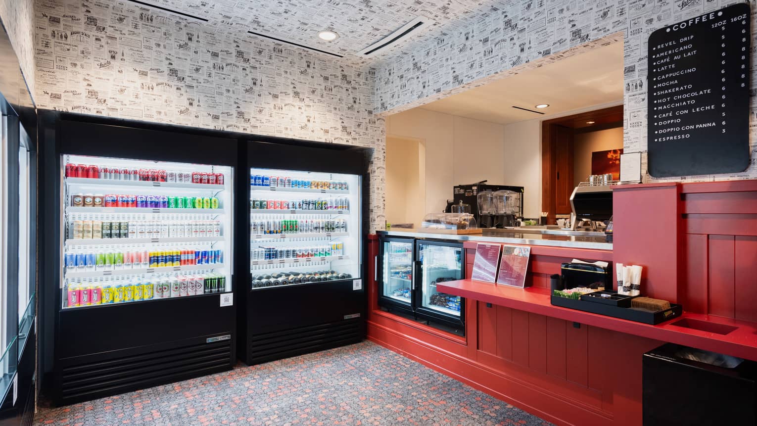 A grab-and-go takeaway counter with two cooler walls of drinks at Four Seasons Resort Jackson Hole