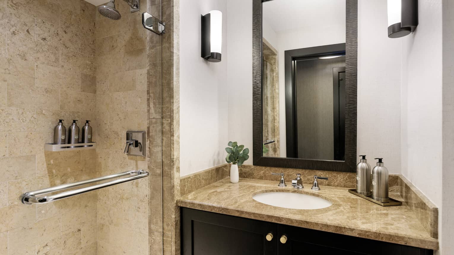 Bathroom with single vanity and walk-in shower