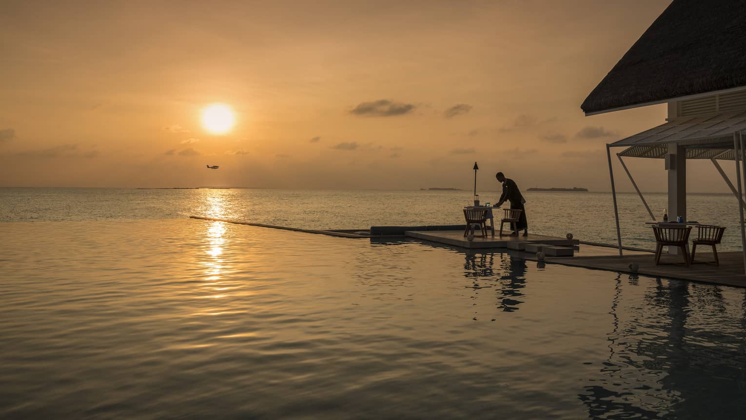 An intimate sunset dinner on a a dock at the Blu Beach Club