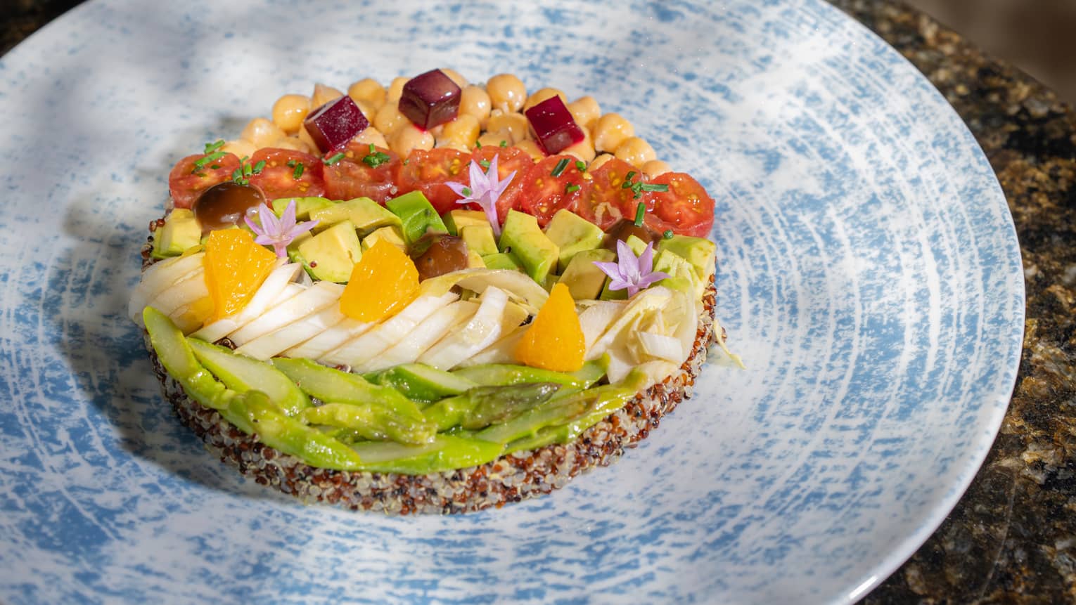 Vegan Cobb Salad with Quinoa, Beetroot, Asparagus, Chickpeas, Orange Sections, Cherry Tomato Halves and Avocado Pieces