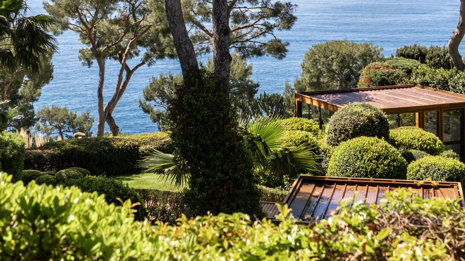 View of the Mediterranean Sea and lush hotel gardens