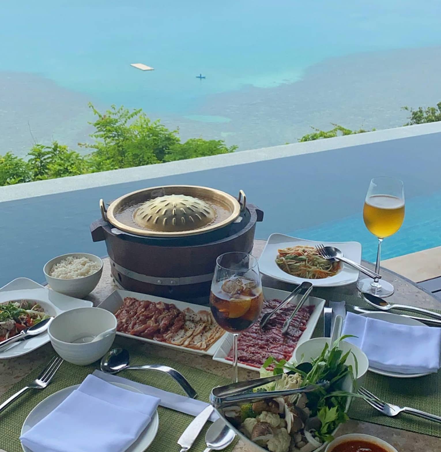 Poolside dining with an ocean view