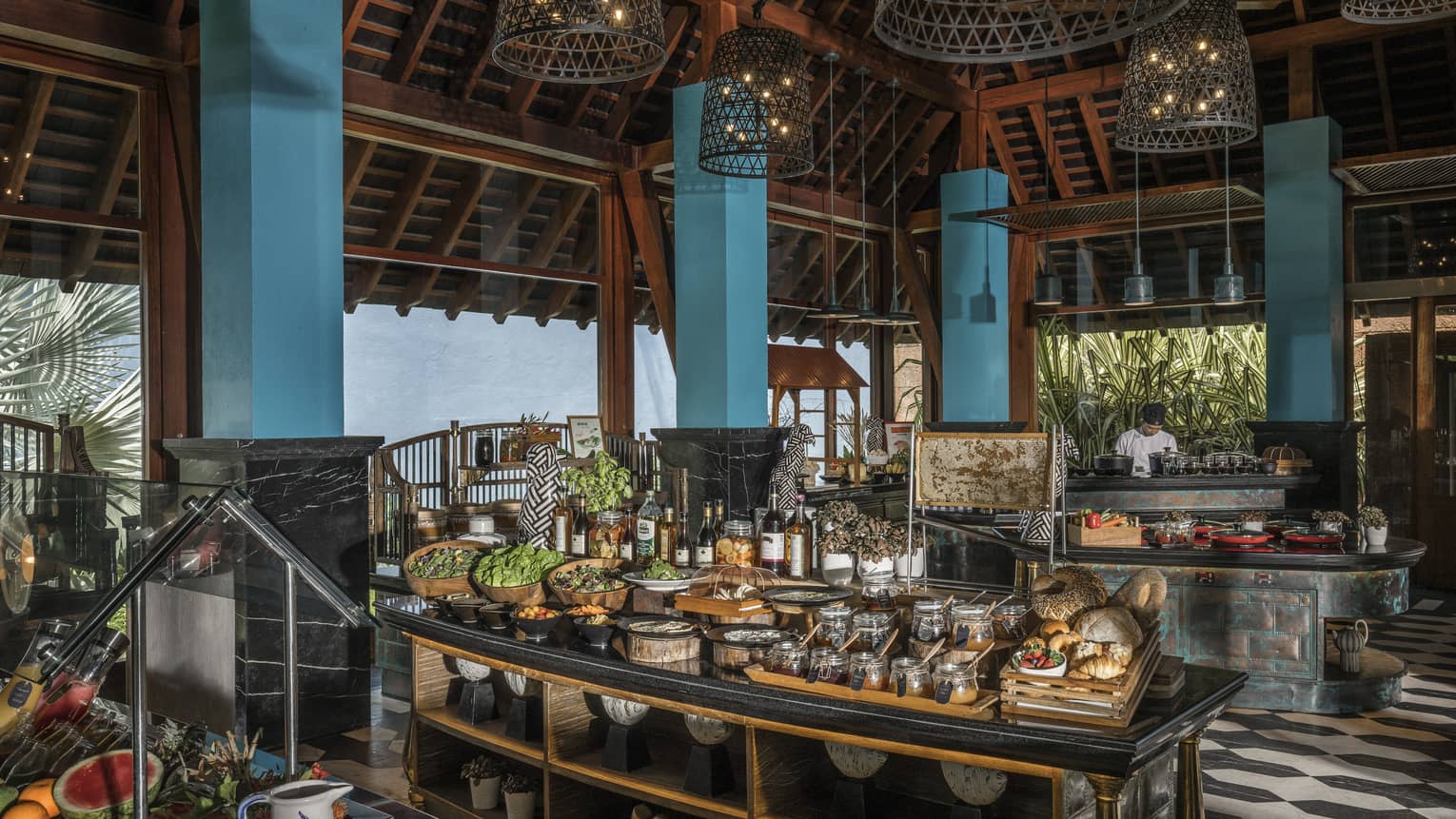 Lower Serai Restaurant Buffet with a chef cooking and fresh fruit