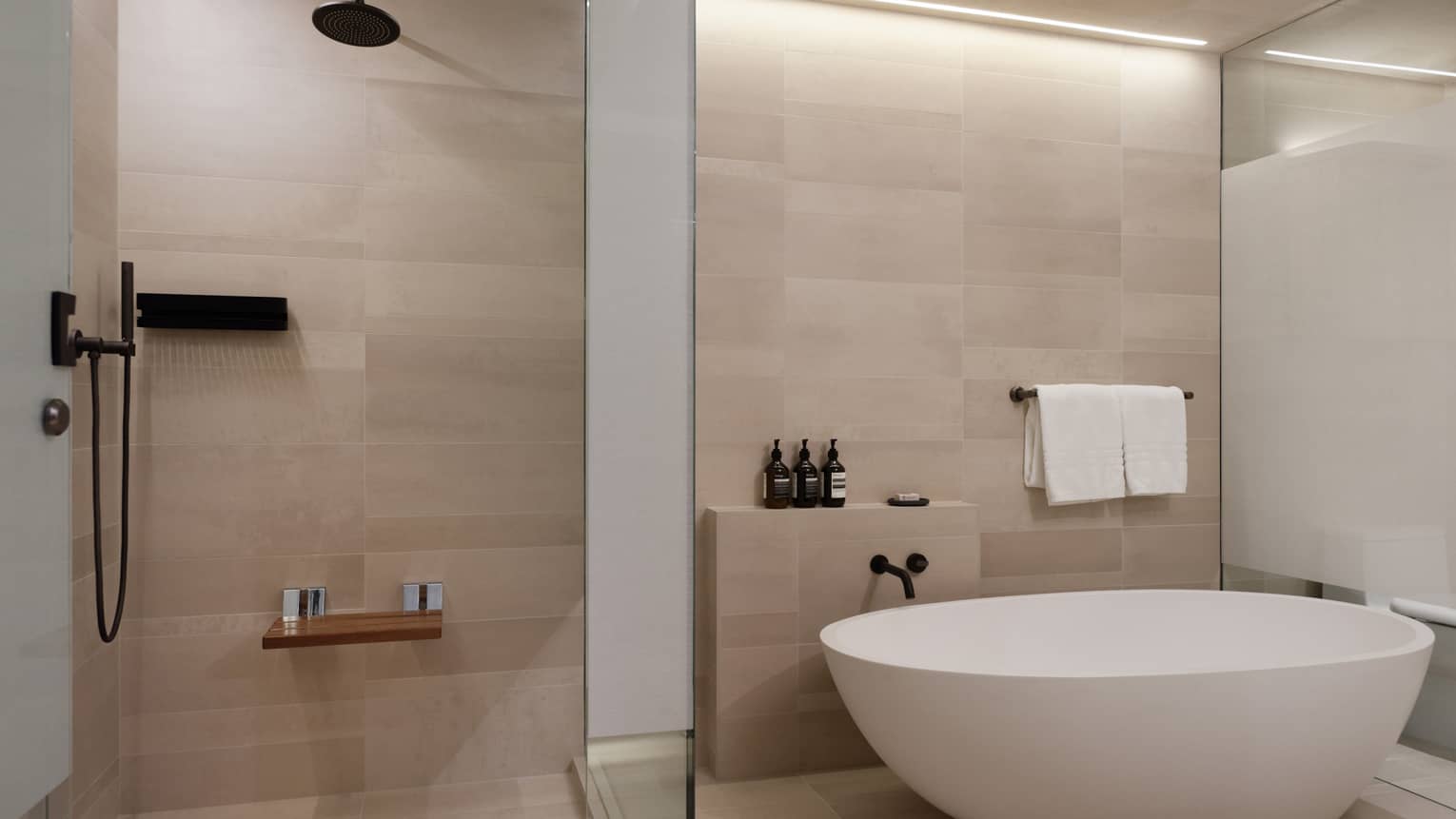 Large contemporary bathroom with standalone oval tub and walk-in shower