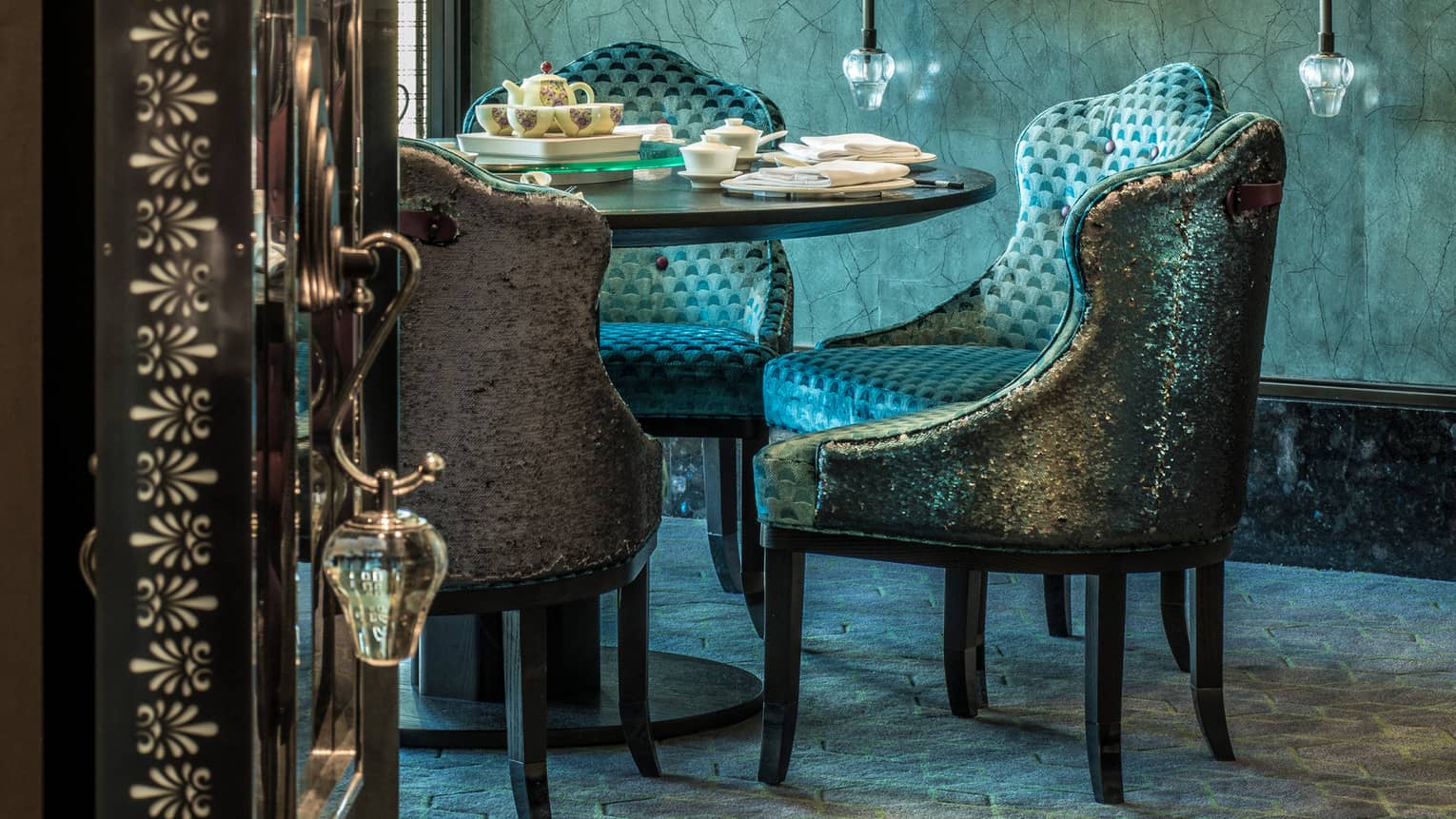 Yun House seating area with art on the wall