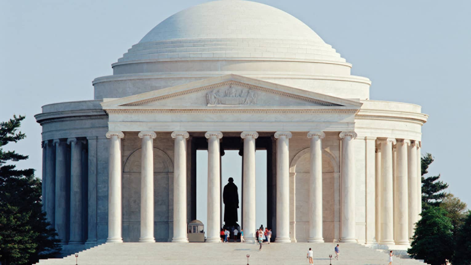 Thomas Jefferson Memorial, people are walking along the stairs.