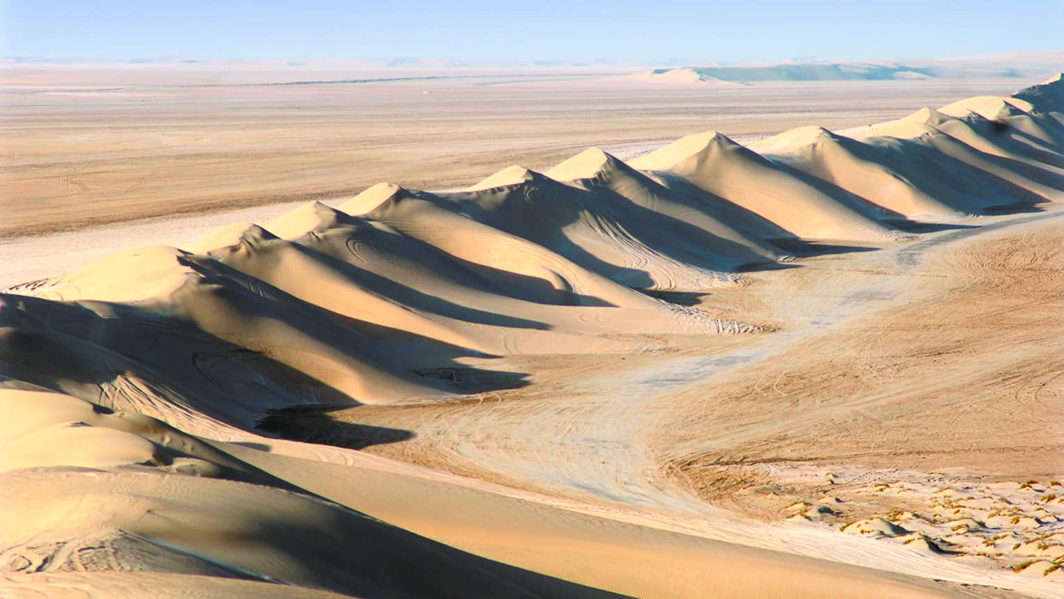 Aerial view of dramatic sand dunes