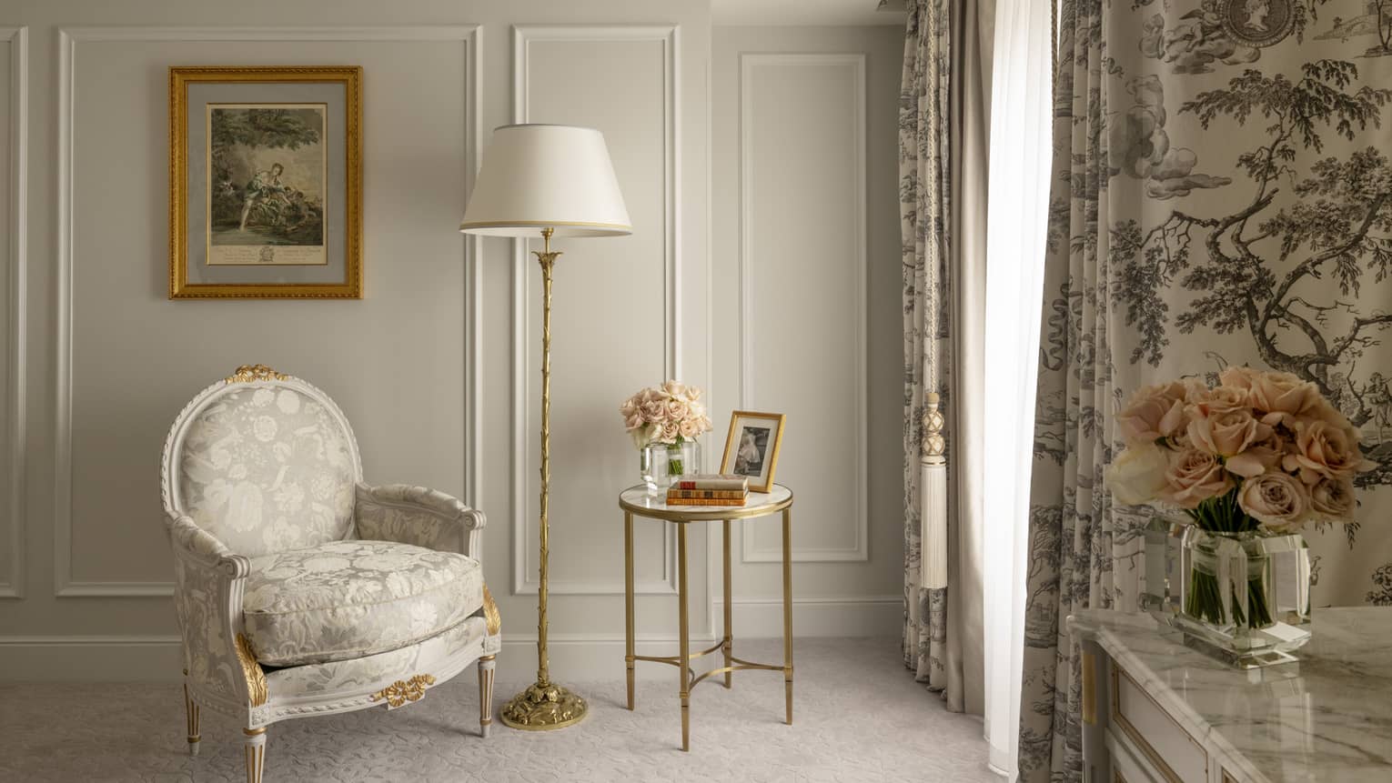 Corner area of bedroom with French upholstered chair and drapery