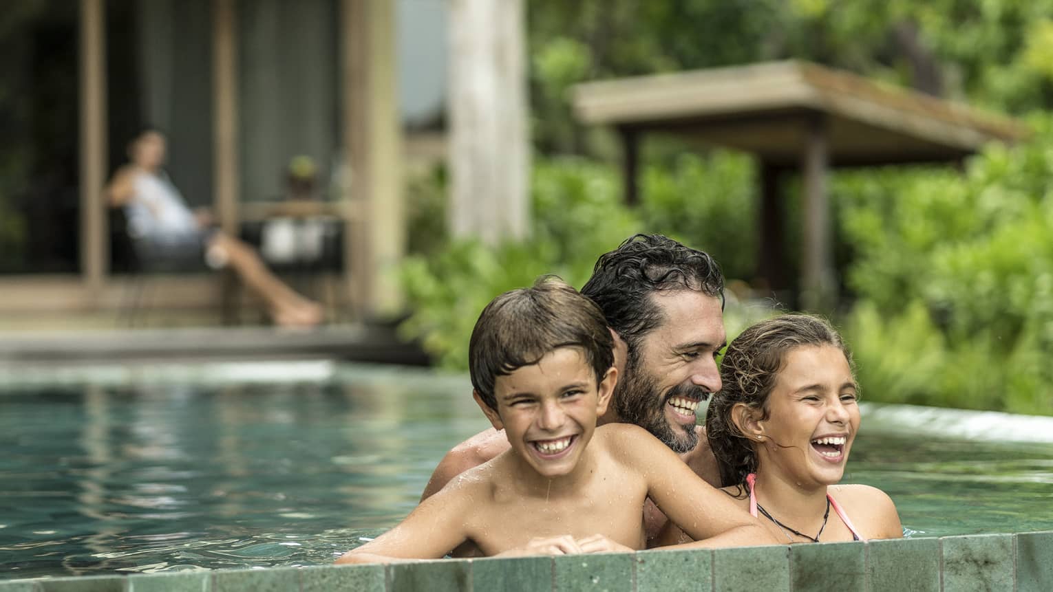 family in a pool