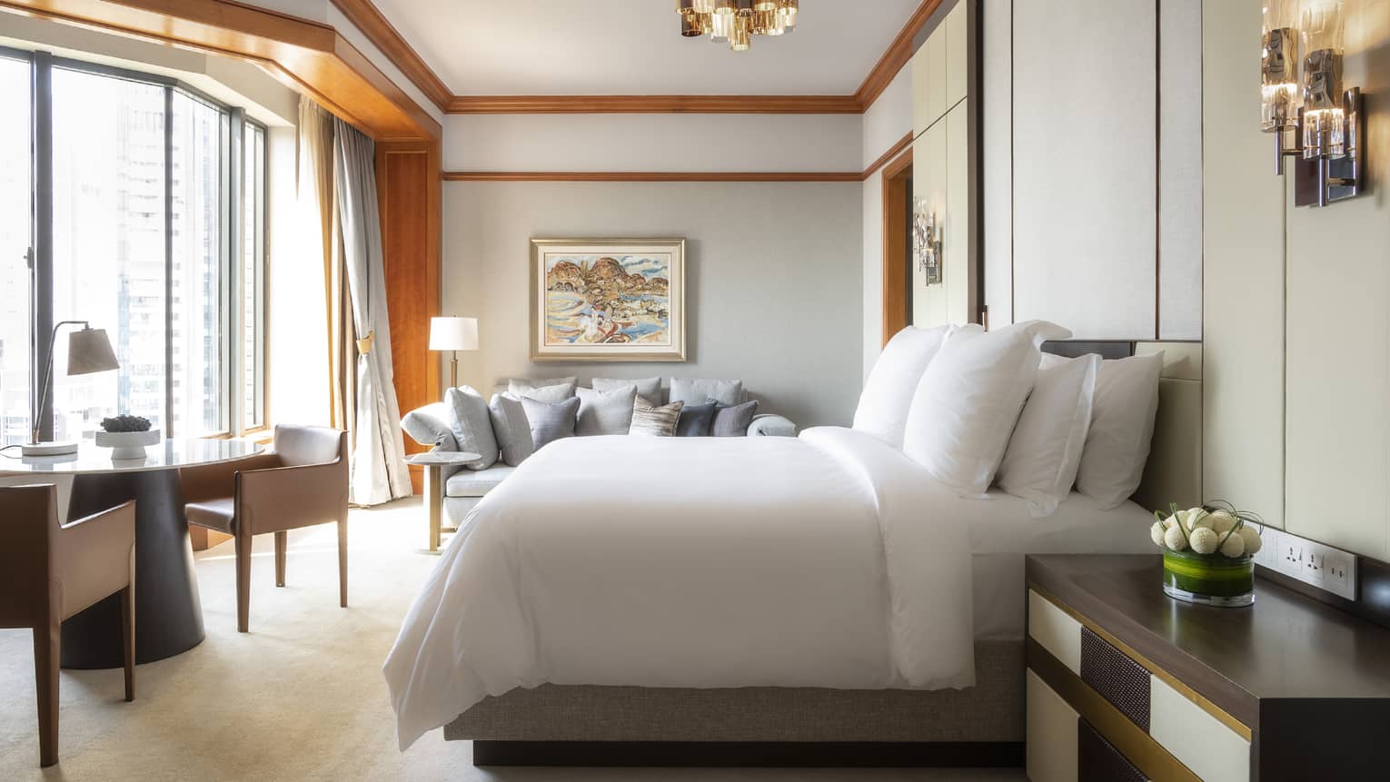 Governor Suite Bedroom with small dining area and floor-to-ceiling windows