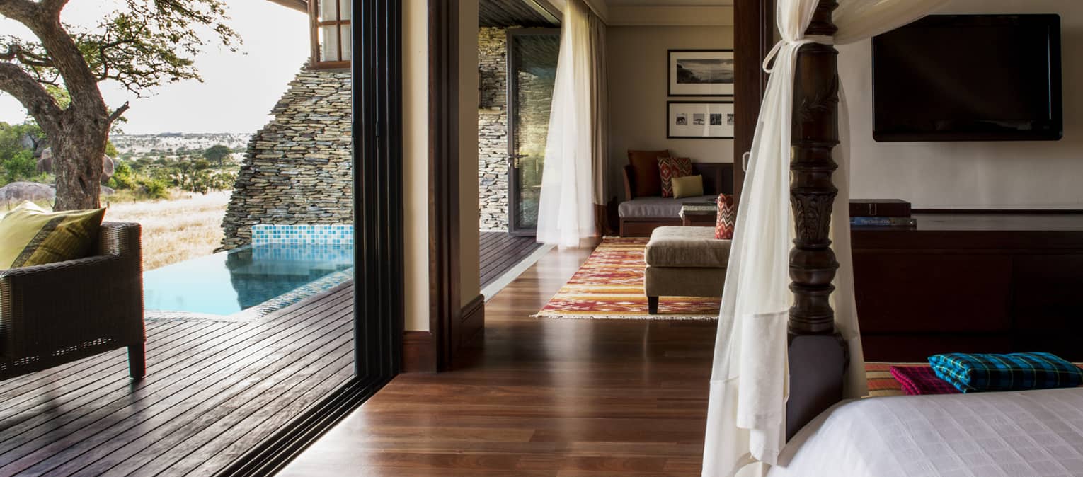 Terrace Suite Waterhole View poster bed, canopy by open wall to plunge pool
