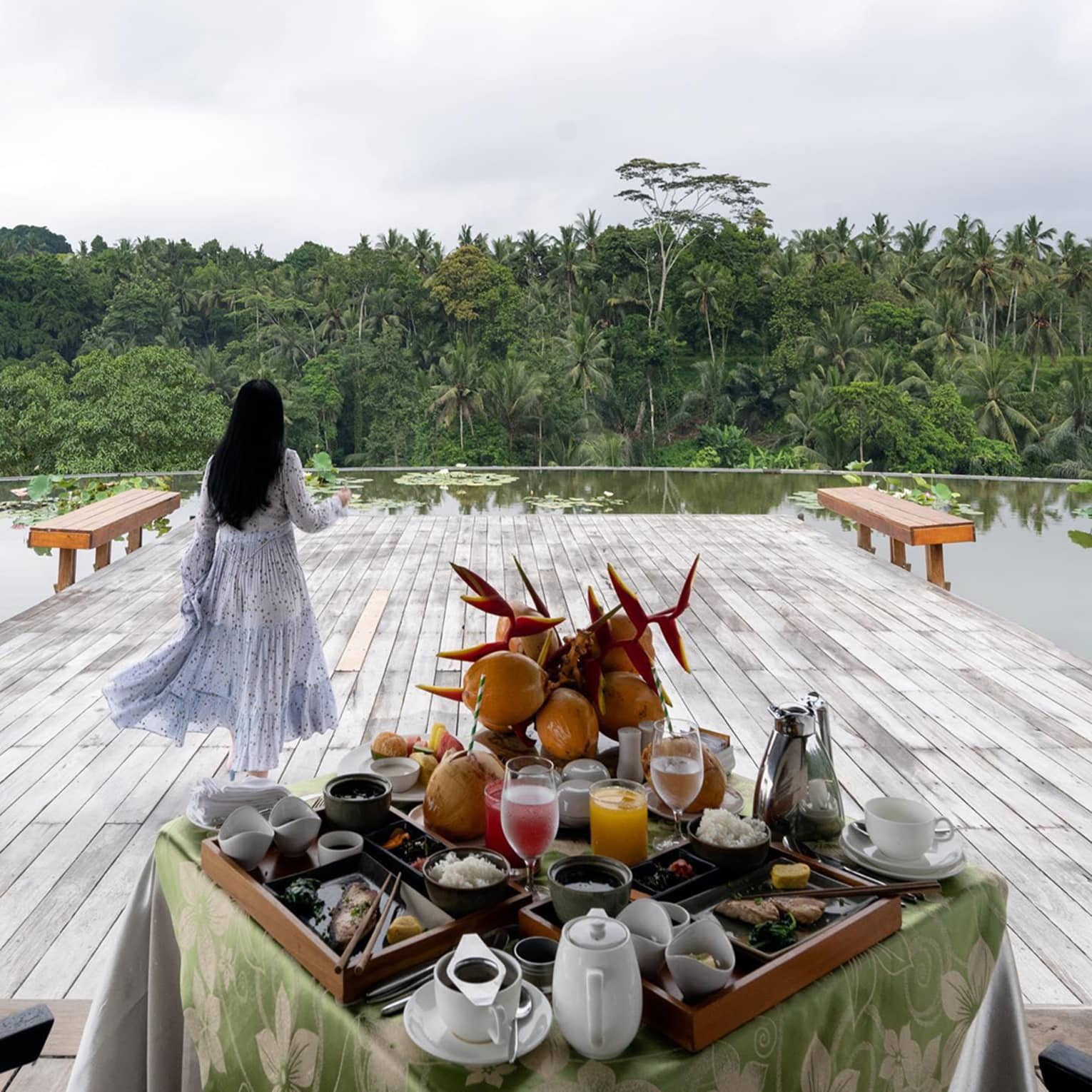 Woman on decking overlooking Ayung River Valley