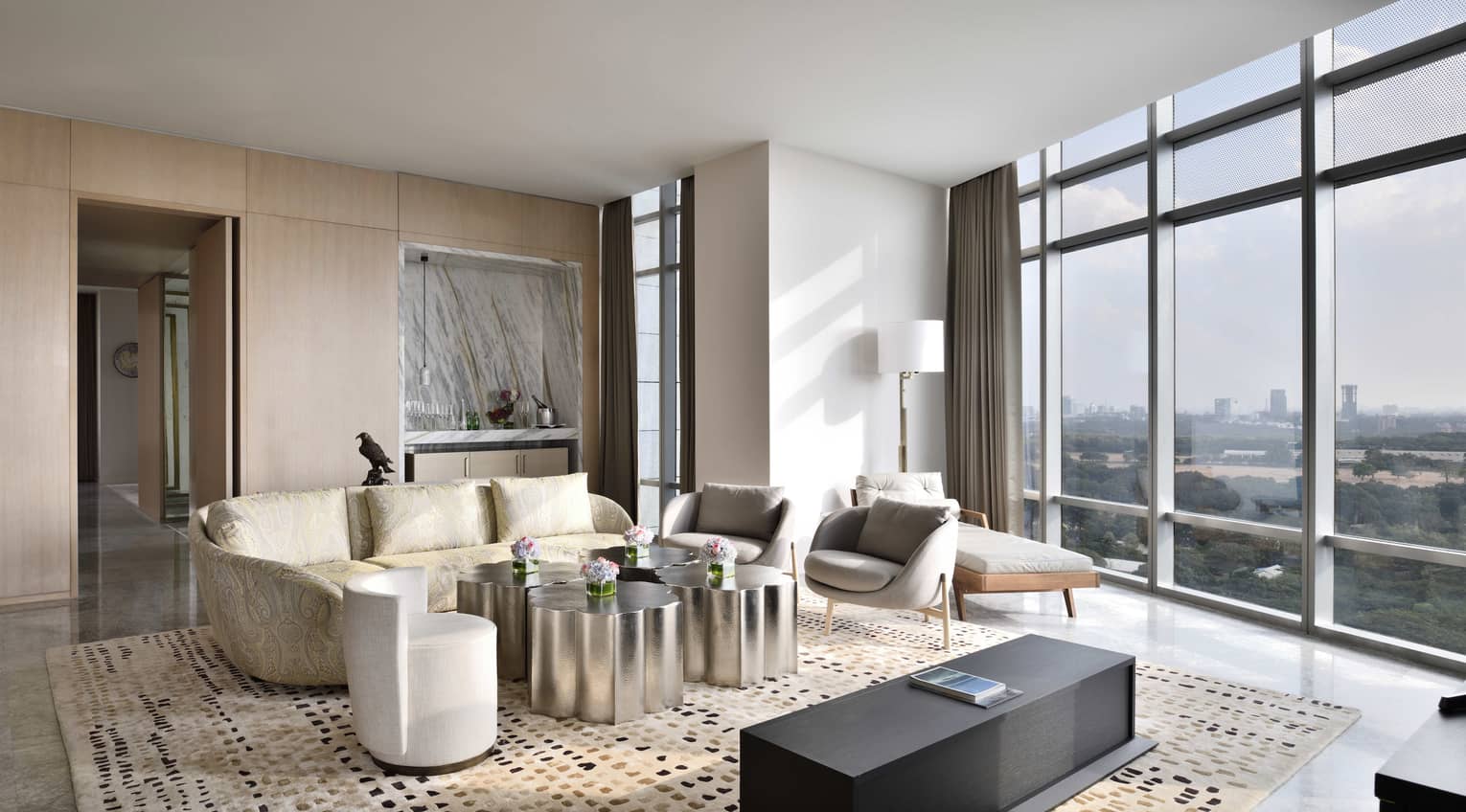 Living room with modern, metallic coffee table