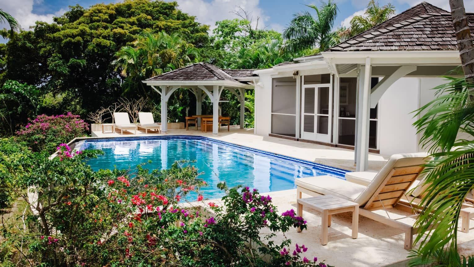 Exterior of tropical villa with pool