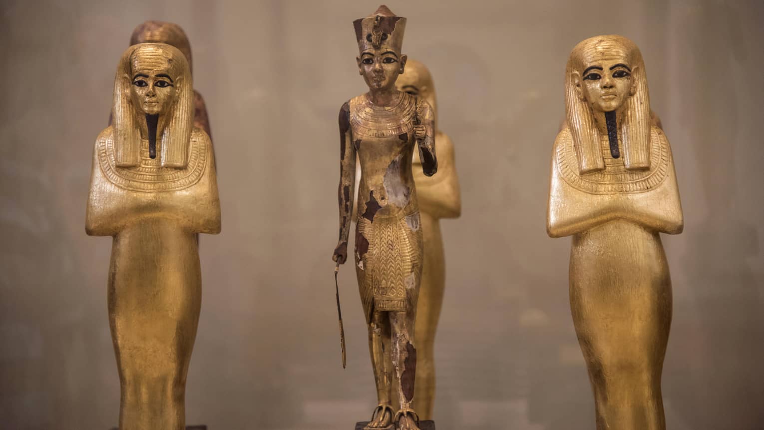 Three Egyptian statues in museum