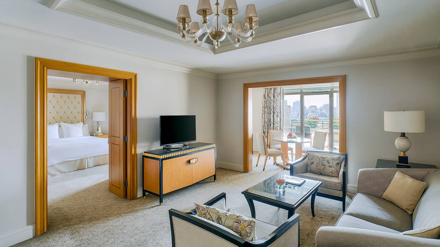 Living room with double doors to bedroom