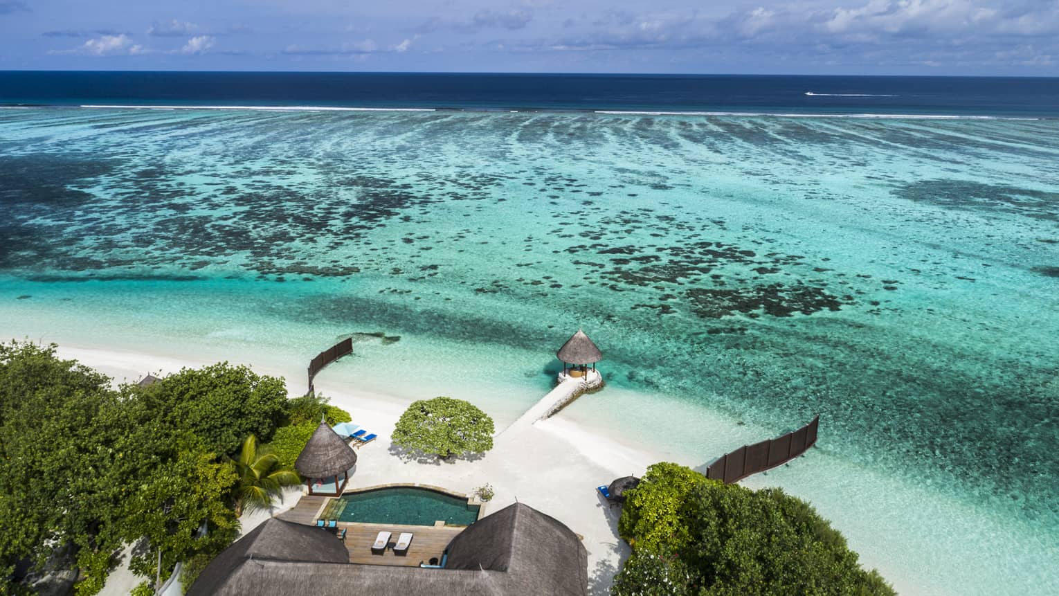 Aerial view of the Two-Bedroom Royal Beach Villa and its private beach in the Maldives