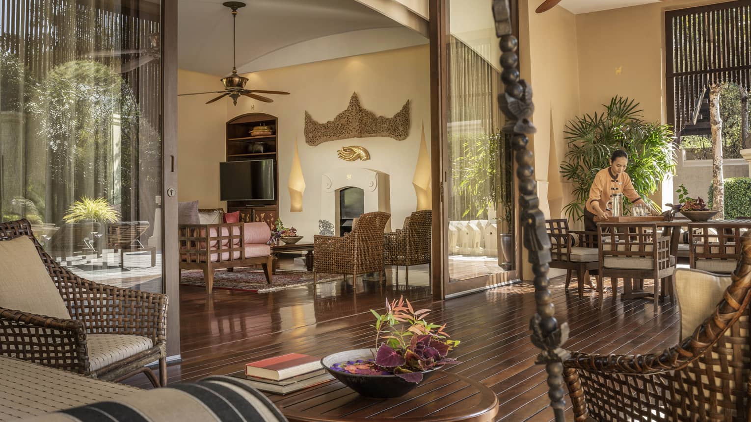 Staff sets dining table in Three-Bedroom Grand Residence