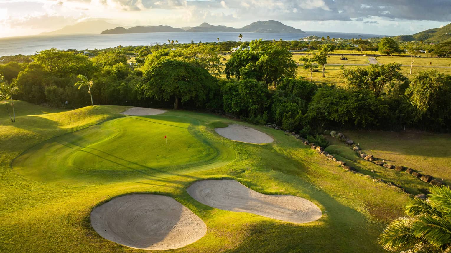 A golf course near the ocean.