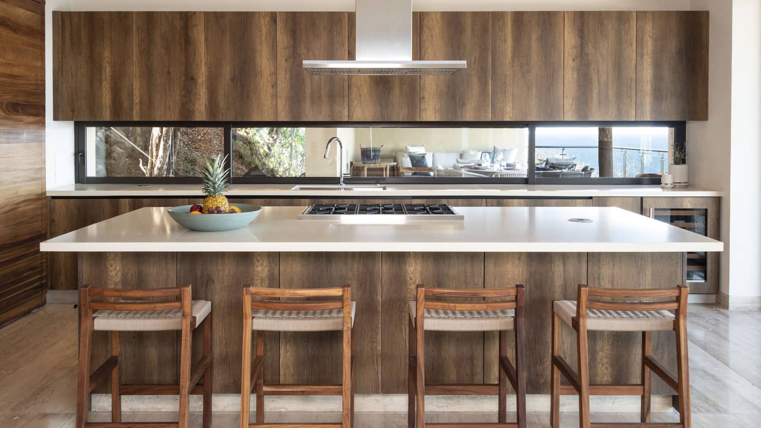 Kitchen with island and bar stools