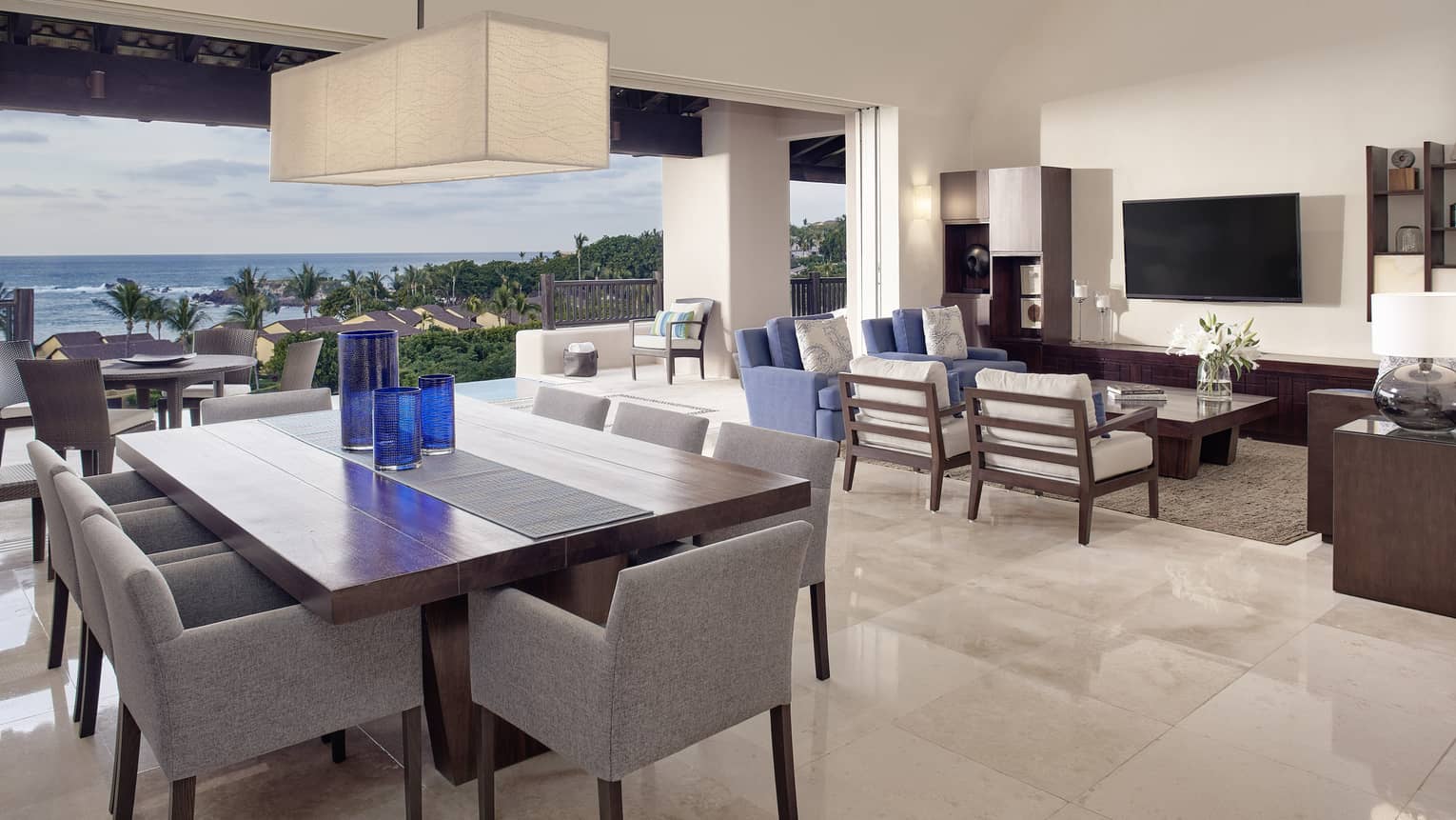 Dining Area and Living Room at Four-bedroom Ocean-view Penthouse in Mexico.