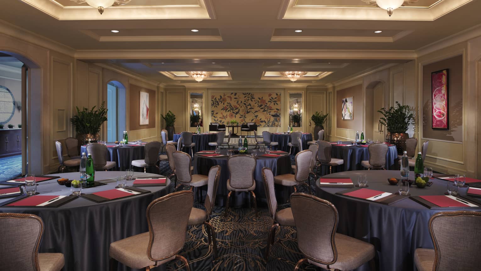 Karel Meeting Room round tables under small crystal chandeliers