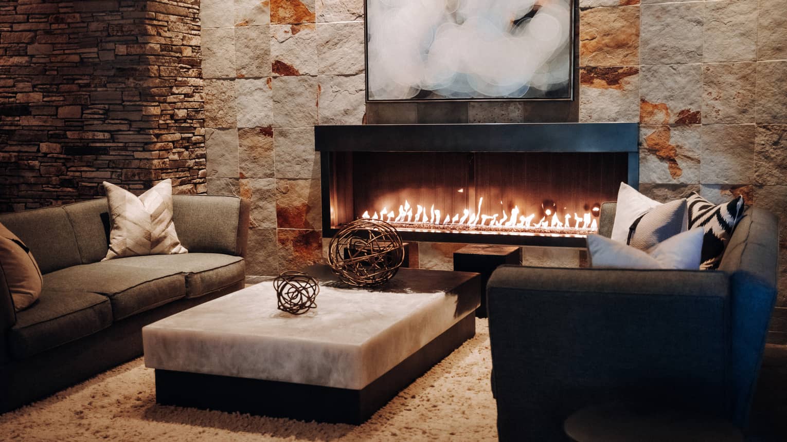 Living room with couches and fireplace