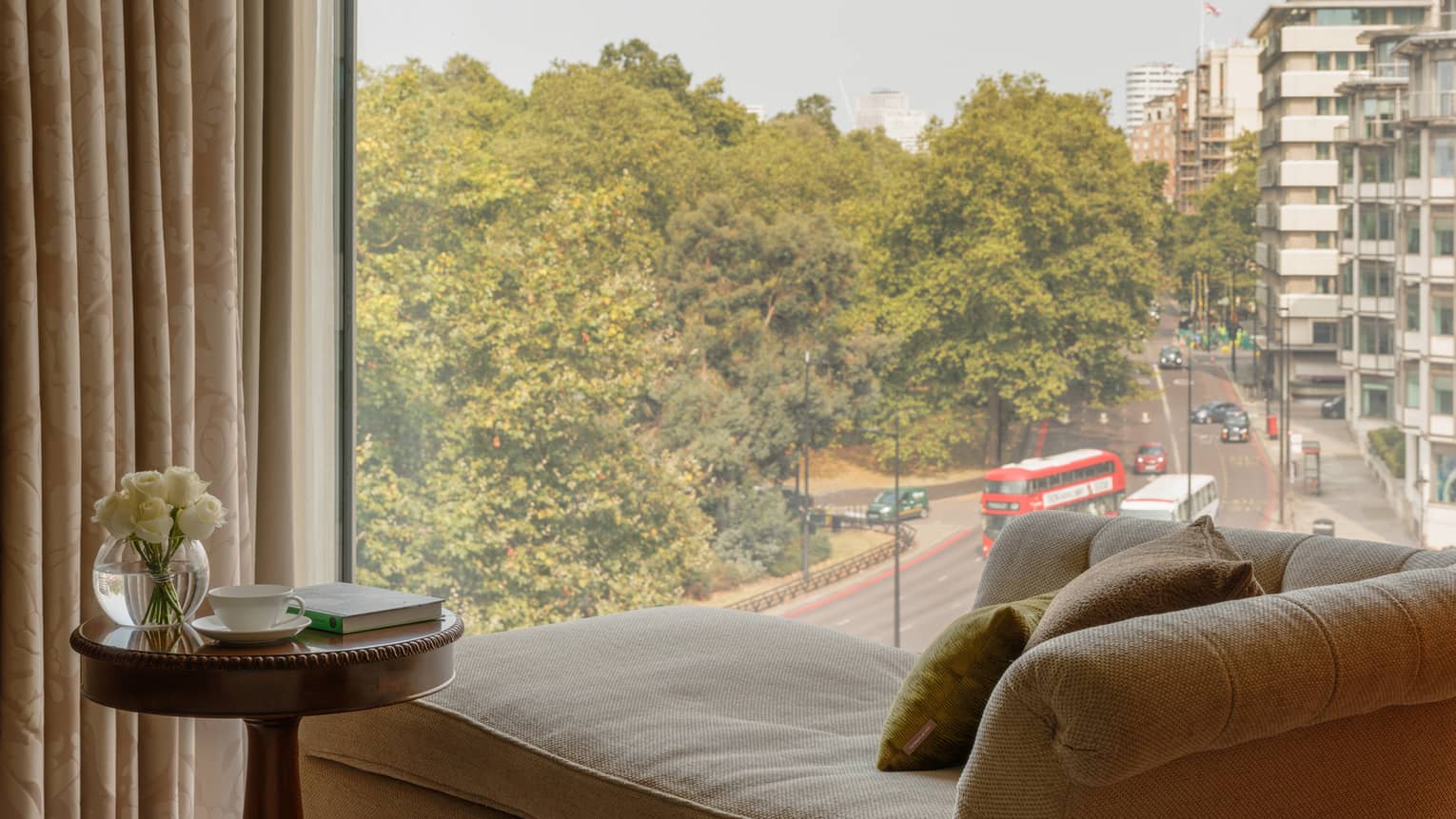 Chaise longue facing a window, overlooking London city street and park