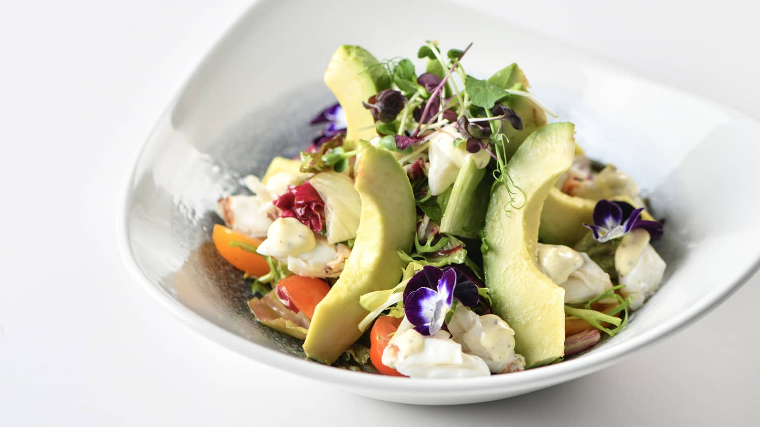 Avocado Crab Salad with Mesclun Leaves, Heirloom Cherry Tomatoes, Truffle-Yuzu Dressing