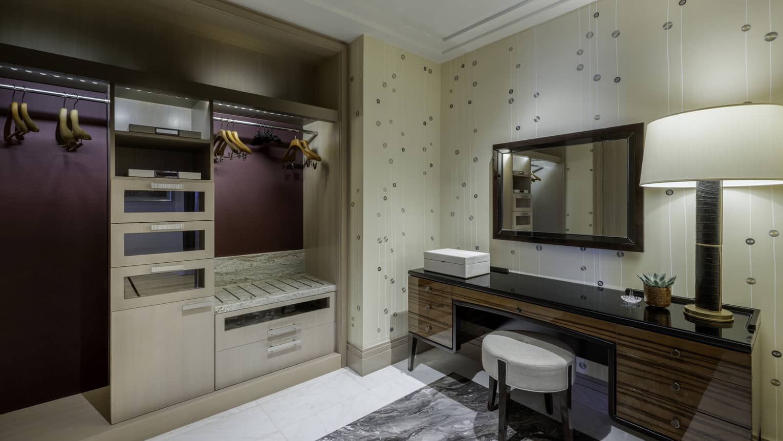 Large dressing room with vanity and closet in hotel suite