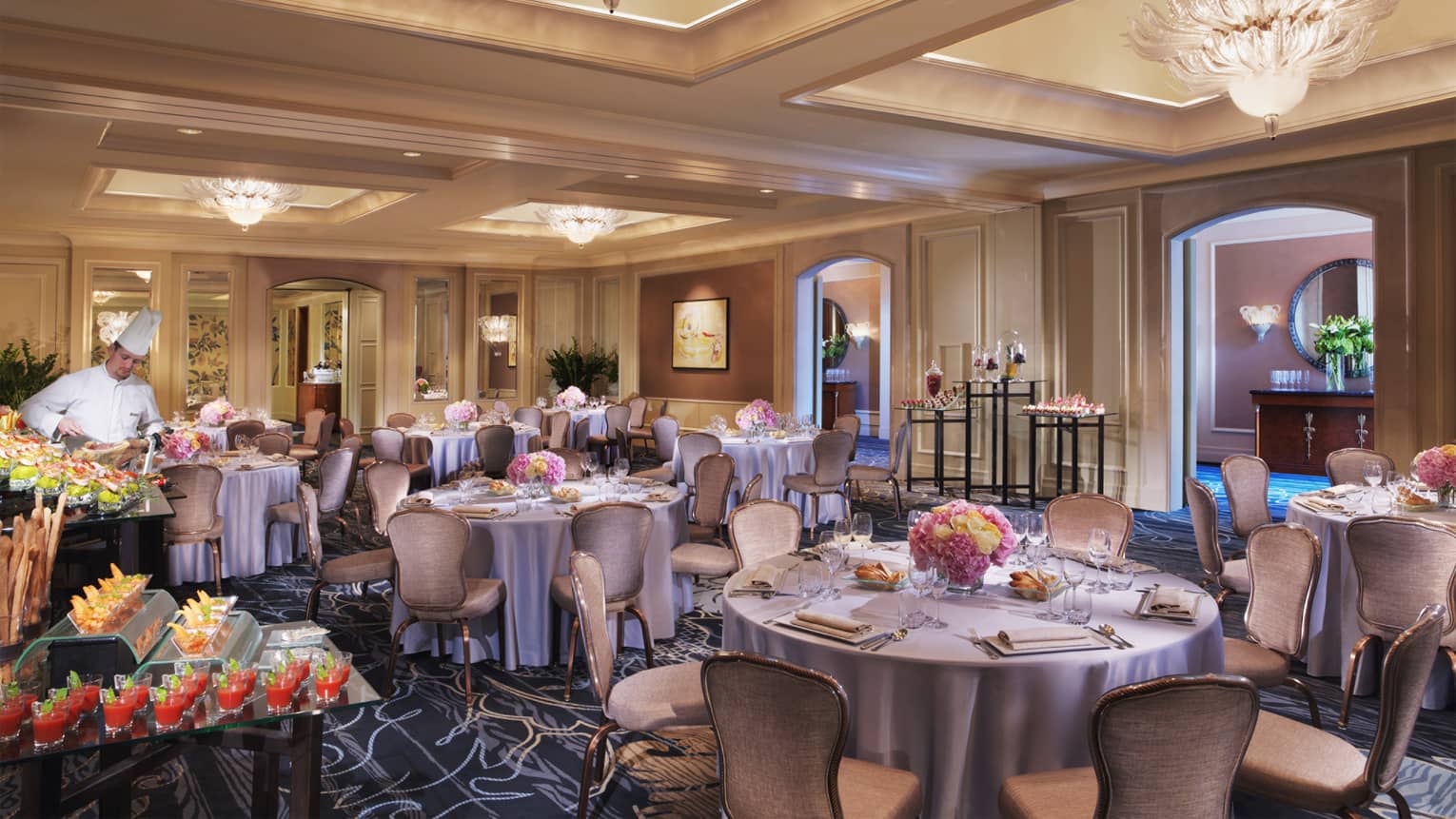 Round banquet tables, appetizer stations in Karel Ballroom