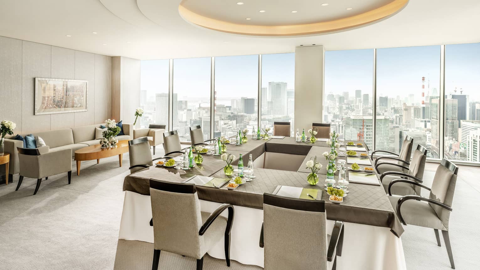 Executive Dining Room with hollow square table, floor-to-ceiling windows with city views