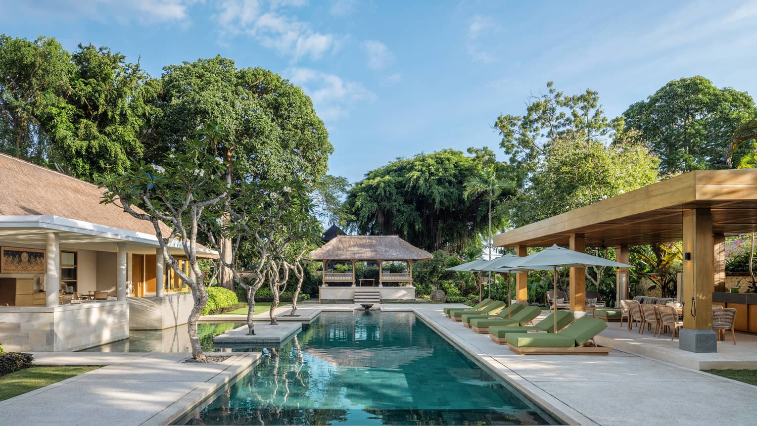Outdoor swimming pool of luxury residence at Four Seasons Resort Bali at Jimbaran Bay