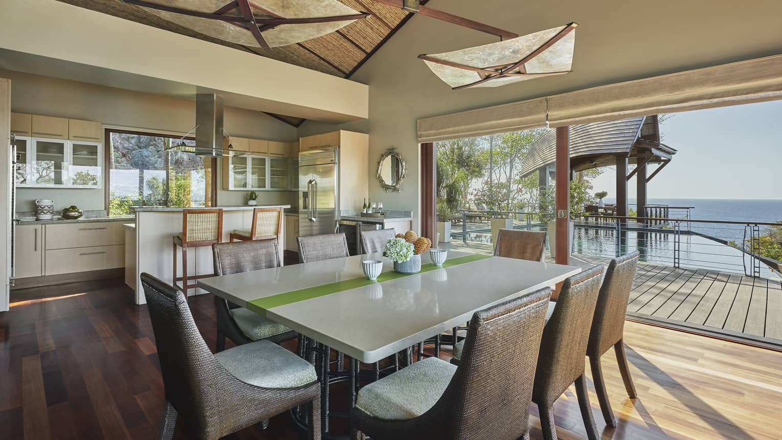 La Luna dining table, kitchen and open wall to patio