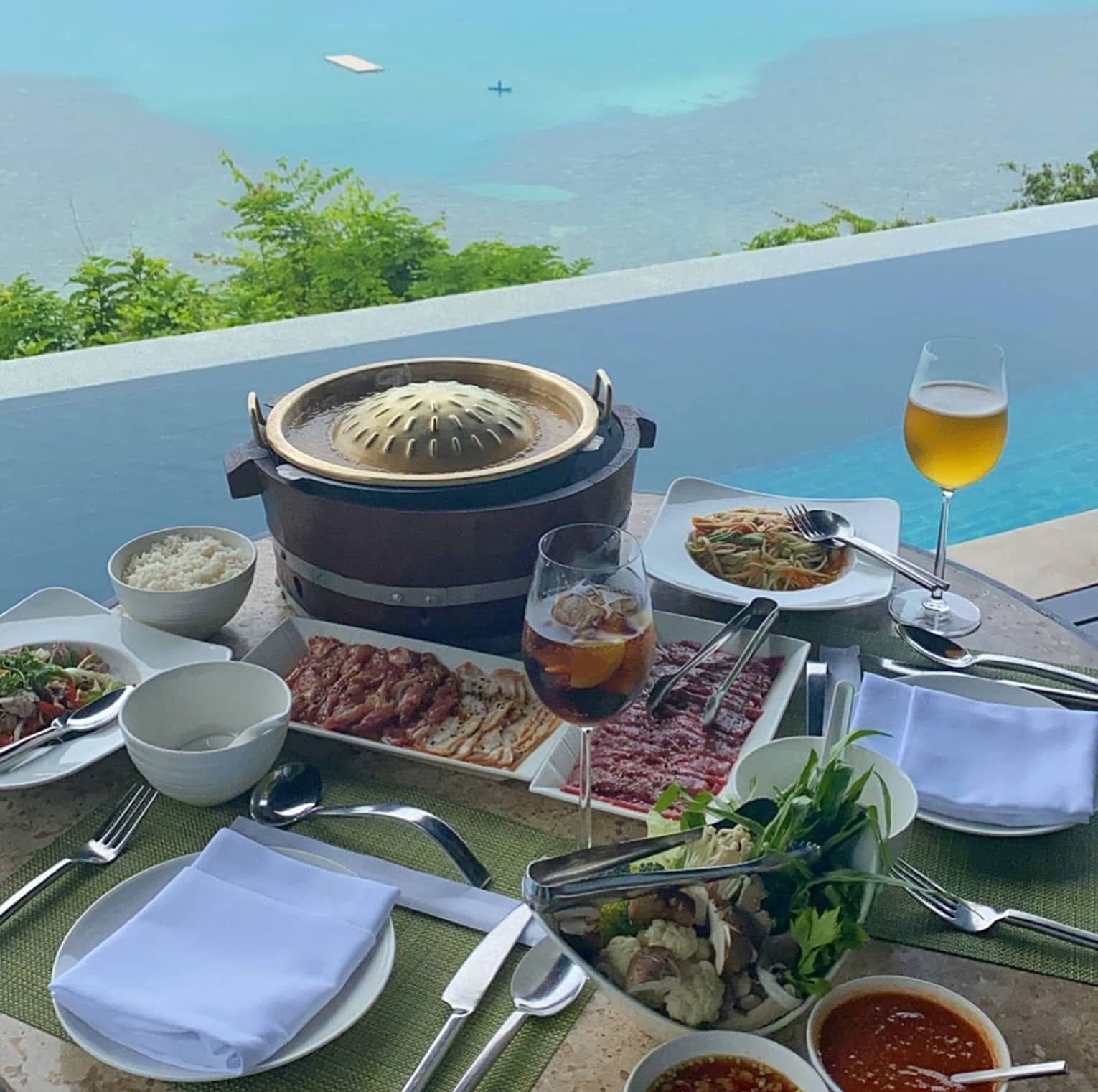 Poolside dining with an ocean view