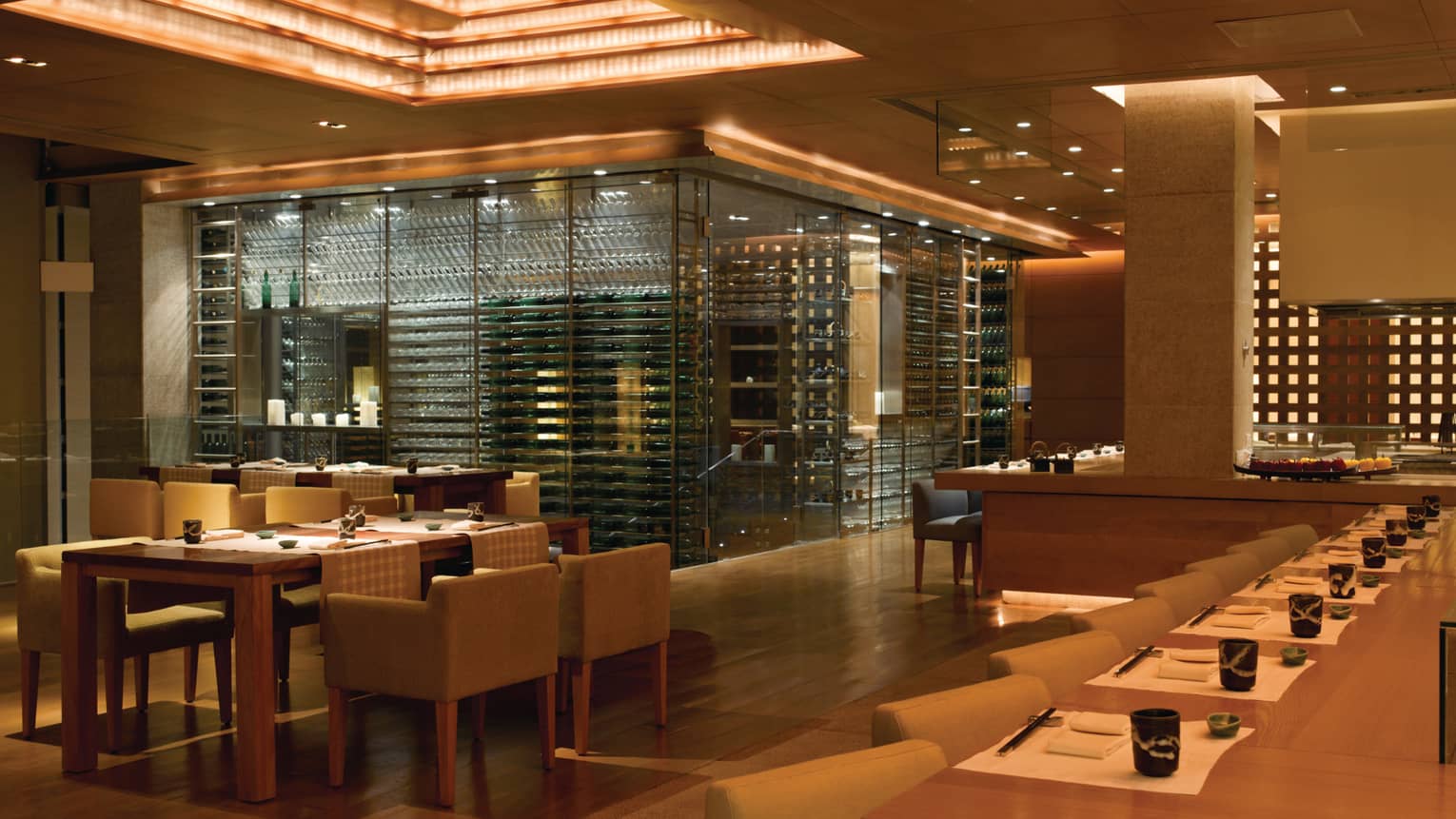San Qi Upper Level dining room, large glass room with wine cellar racks, glasses