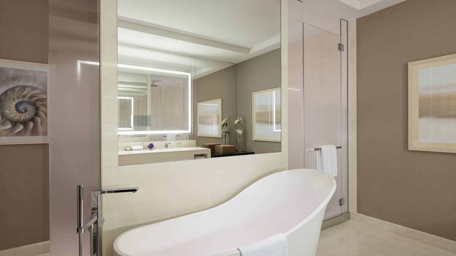 Bathroom with freestanding tub, large mirror
