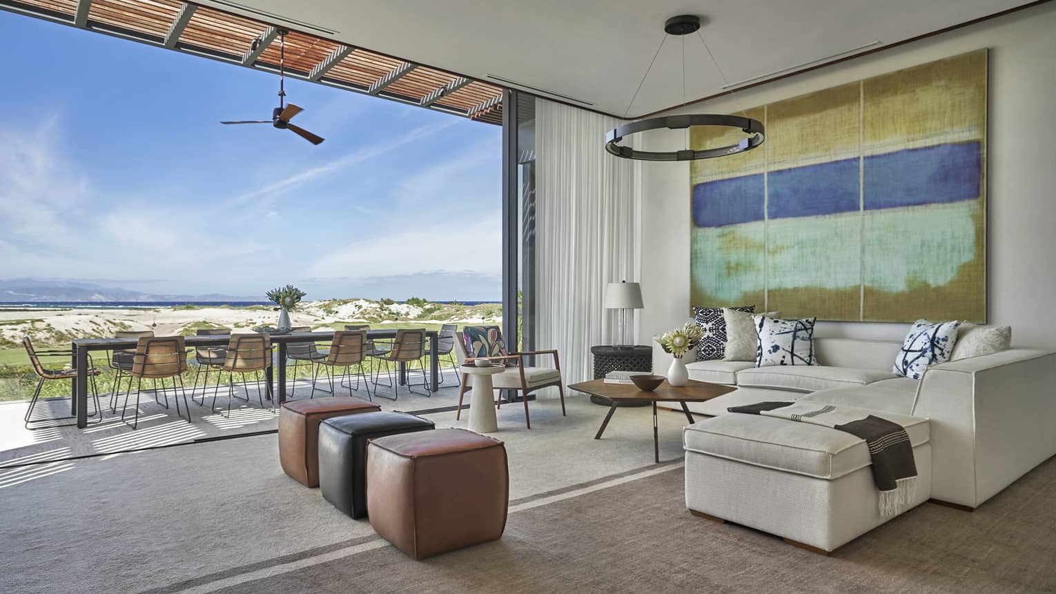 Casita accommodation living room with walkout to deck and landscape view