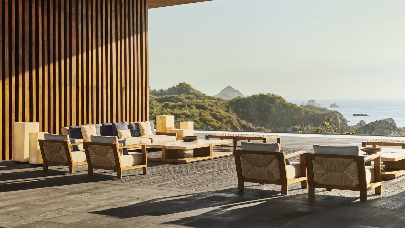 A large open seating area looking out at the ocean.