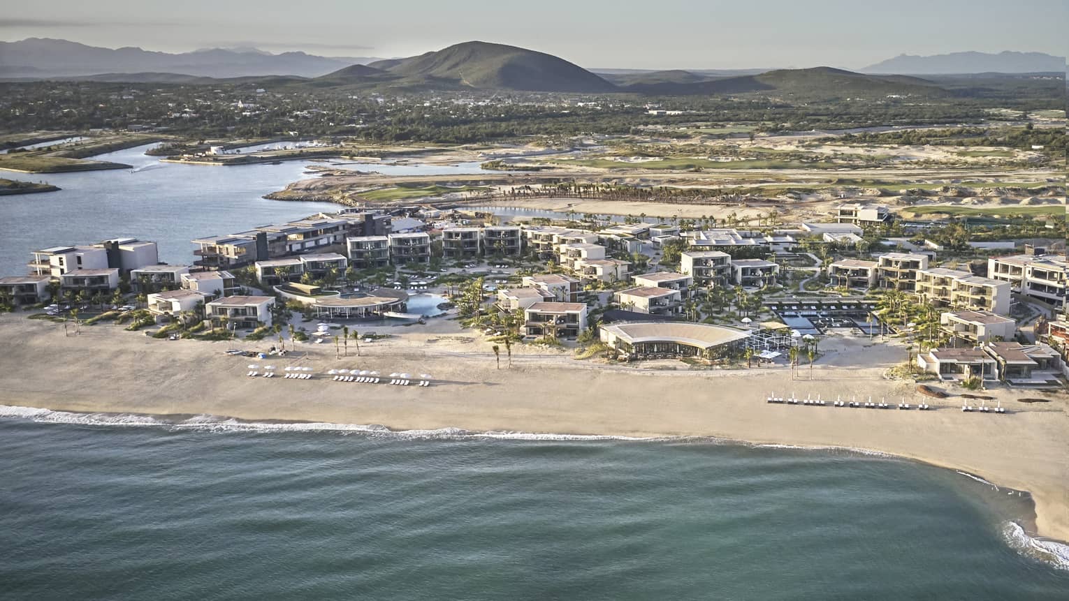 Aerial view of a beachside resort in Los Cabos