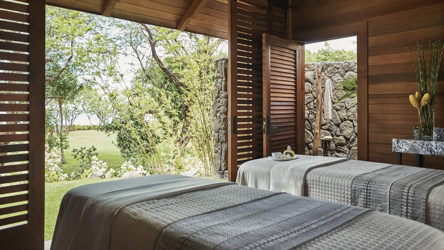 Spa Hale Couples Room side-by-side in pavillions with open sliding wood shutters