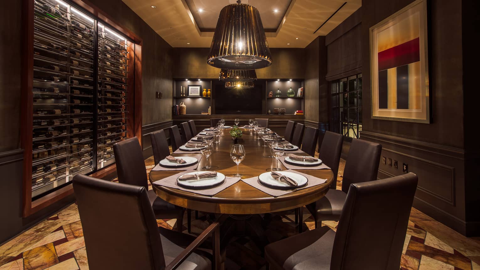 Culina private dining table in dimly-lit wine cellar room