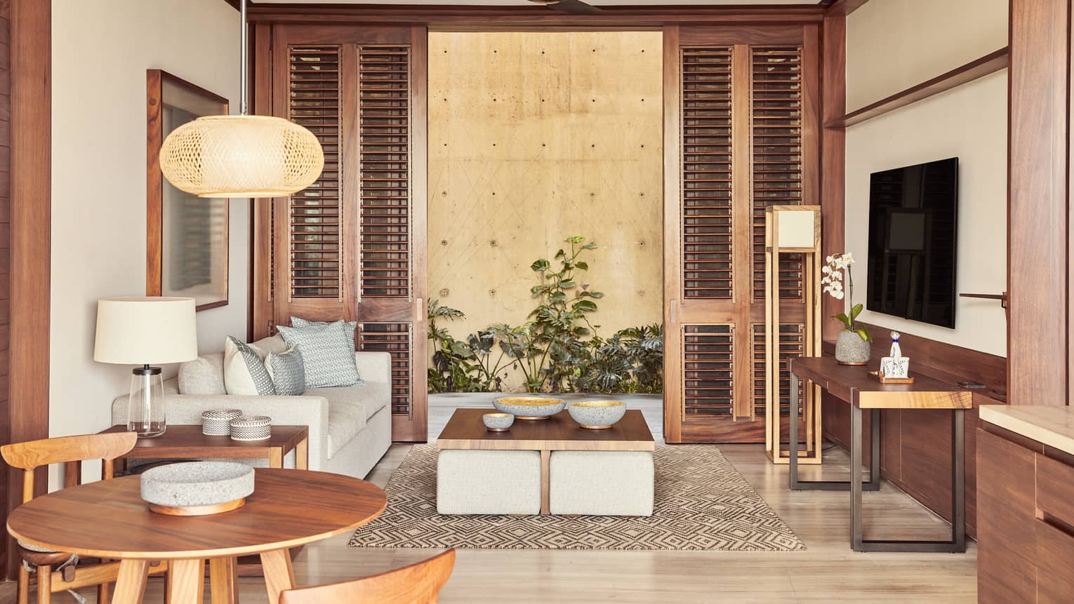 Resort suite living room with contemporary wood accents