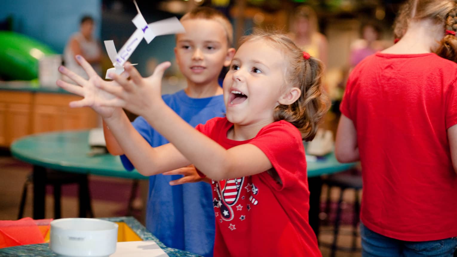 Children playing in an interactive museum exhibit